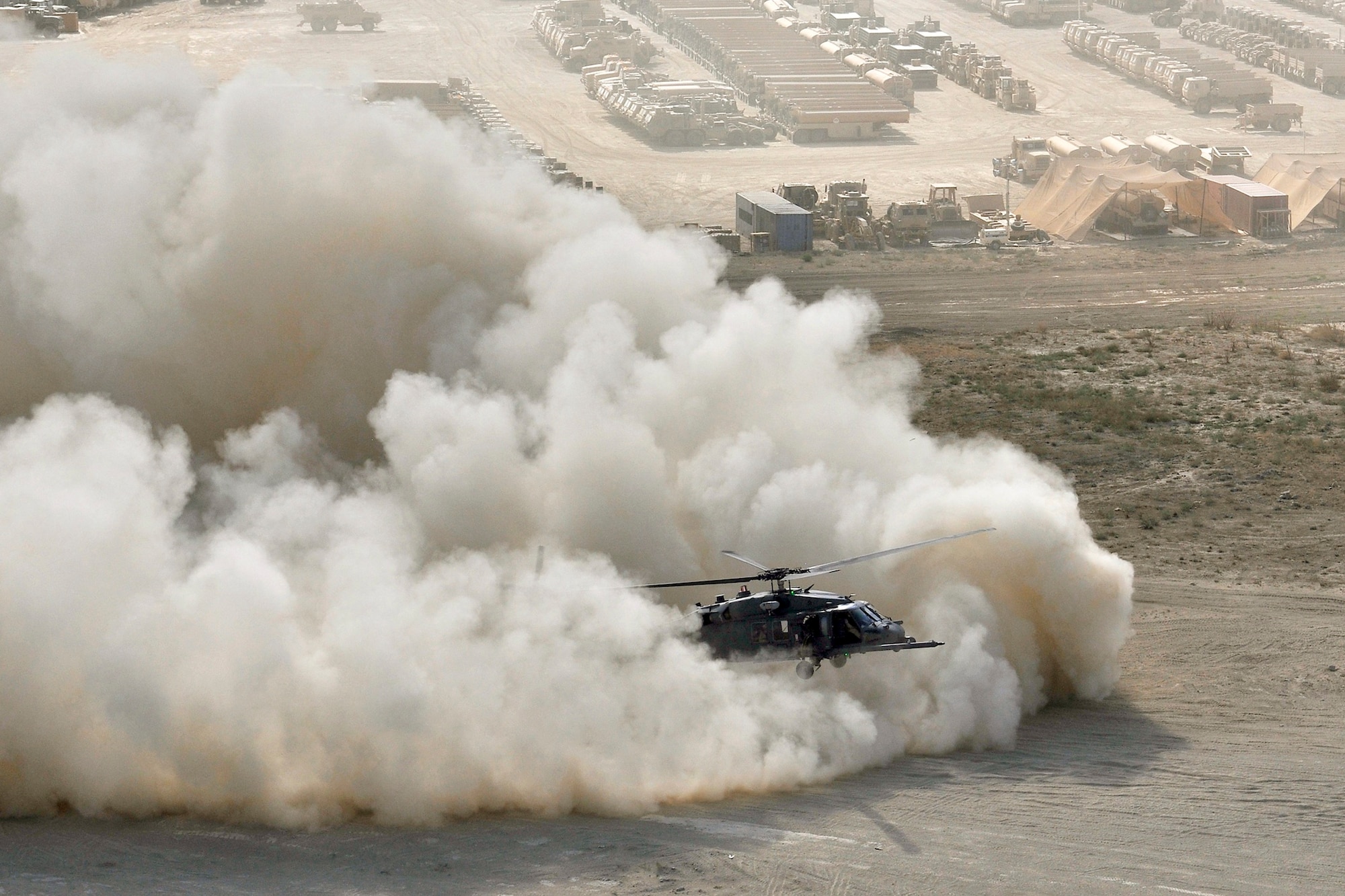 An HH-60G Pave Hawk conducts brownout training in Afghanistan Sep. 24, 2010. (U.S. Air Force photo)