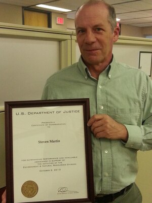 IWR planner Steven Martin was recently recognized with a Certificate of Appreciation from the Department of Justice, Environmental and Natural Resources Division.