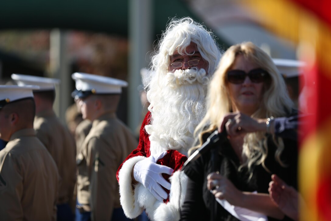 Santa Claus takes his hat off for the retiring of the colors at Carillo Elementary School, Dec. 20. The elementary school held a ceremony dedicated to the donations being given to Marines with Marine Aircraft (MAG) Group 39 stationed aboard Marine Corps Base Camp Pendleton, Calif.


