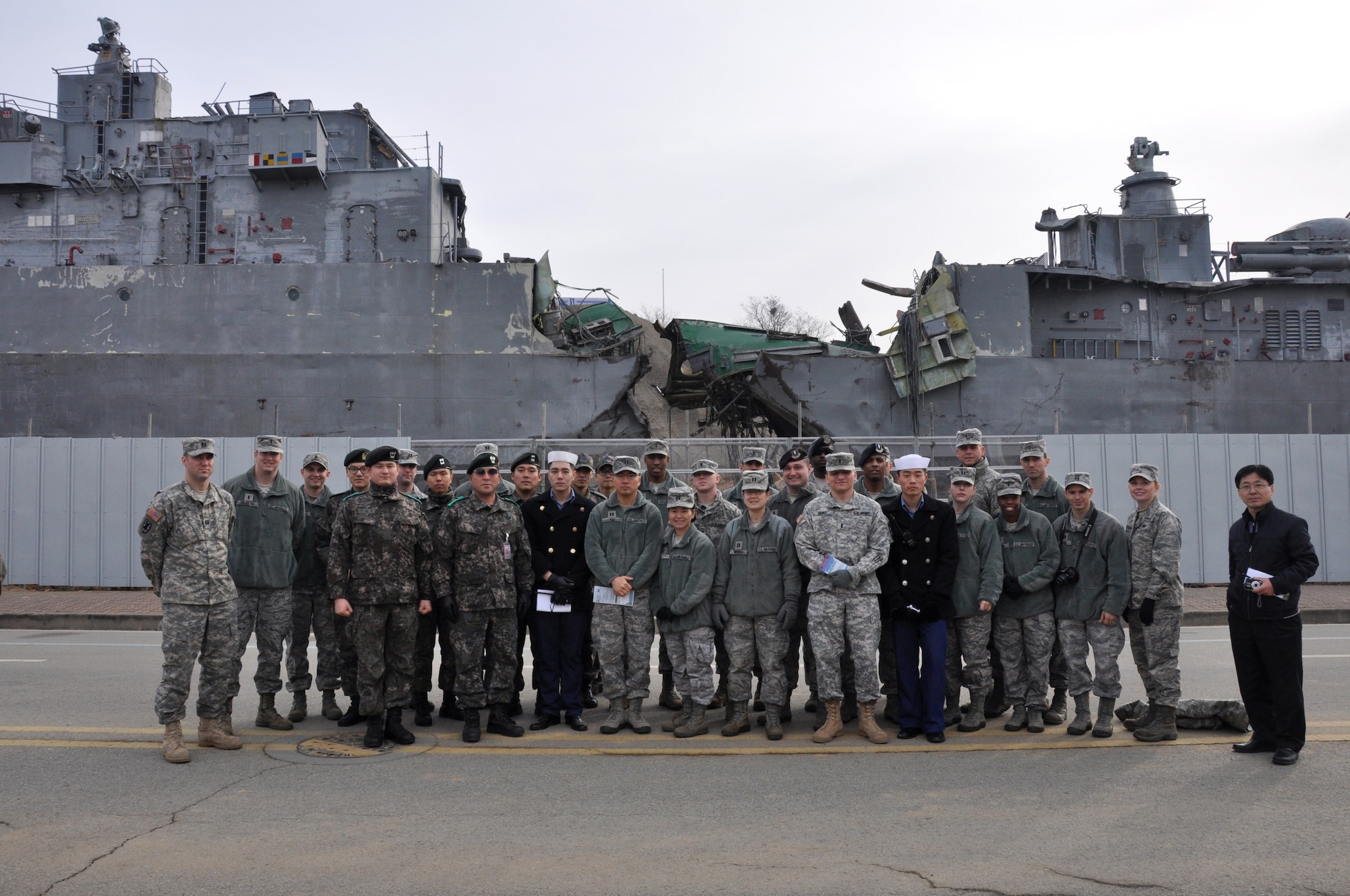 U.S. and Republic of Korea Officers pose for a group photo during a tour of the ROK navy 2nd Fleet Command museum, Pyeongtaek, ROK, Jan. 3, 2014. Company grade officers from the Air Force and the U.S. Army, along with their ROK army, ROK air force and ROKN counterparts, took advantage of the tour to solidify existing bonds between the services and enhance their knowledge of each others’ role in the defense of the ROK. (U.S. Air Force photo/Capt. Tamara Fischer-Carter)