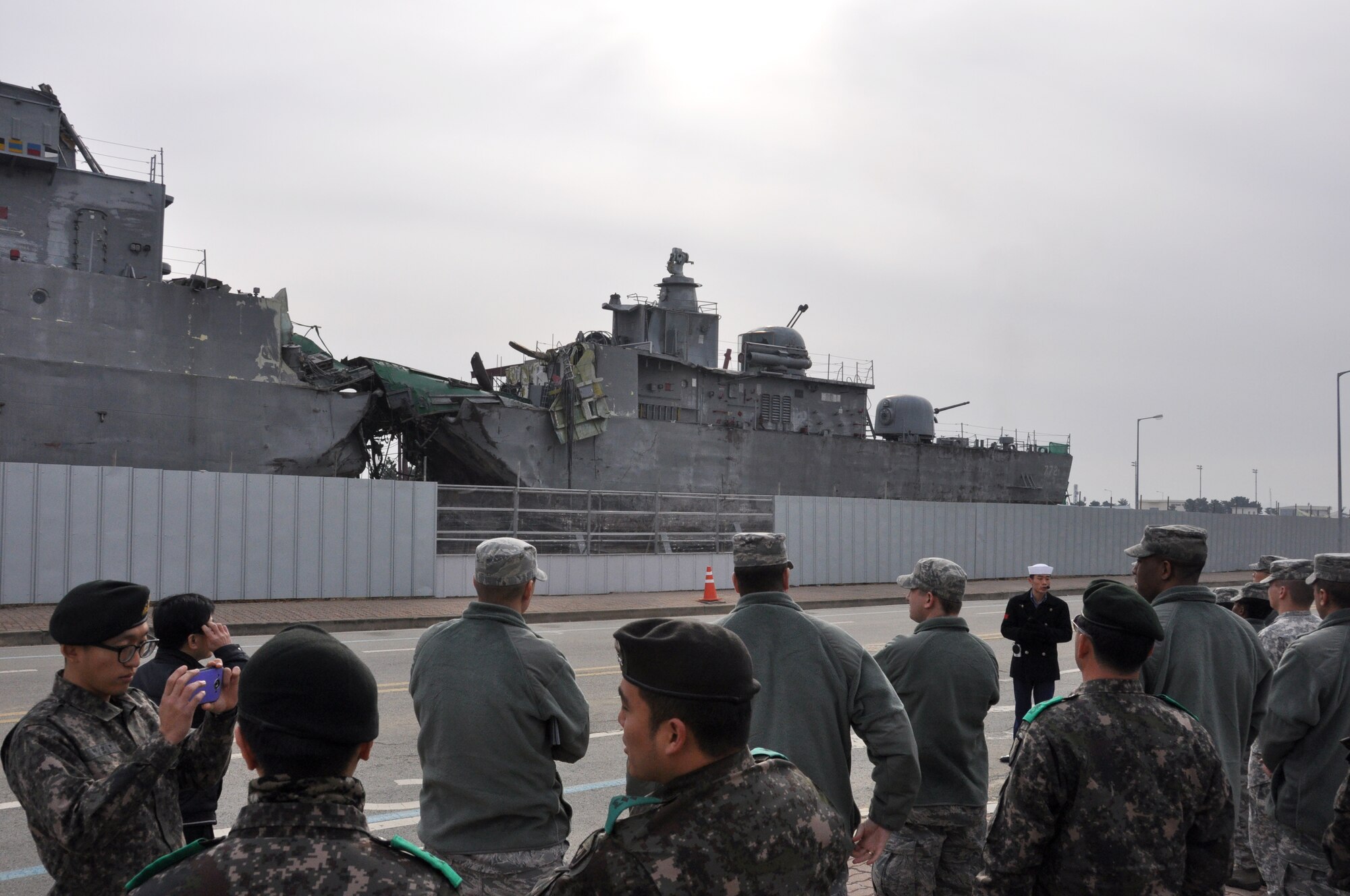 A tour guide gives U.S. and Republic of Korea Officers a tour of the ROK navy 2nd Fleet Command museum, Pyeongtaek, ROK, Jan. 3, 2014.The ROKN hosts educated their visitors about the enemy attack on the Northern Limit Line- a border between the Democratic People’s Republic of Korea and the ROK- that’s claimed the lives of 46 Sailors, March 26, 2010. (U.S. Air Force photo/Capt. Tamara Fischer-Carter)