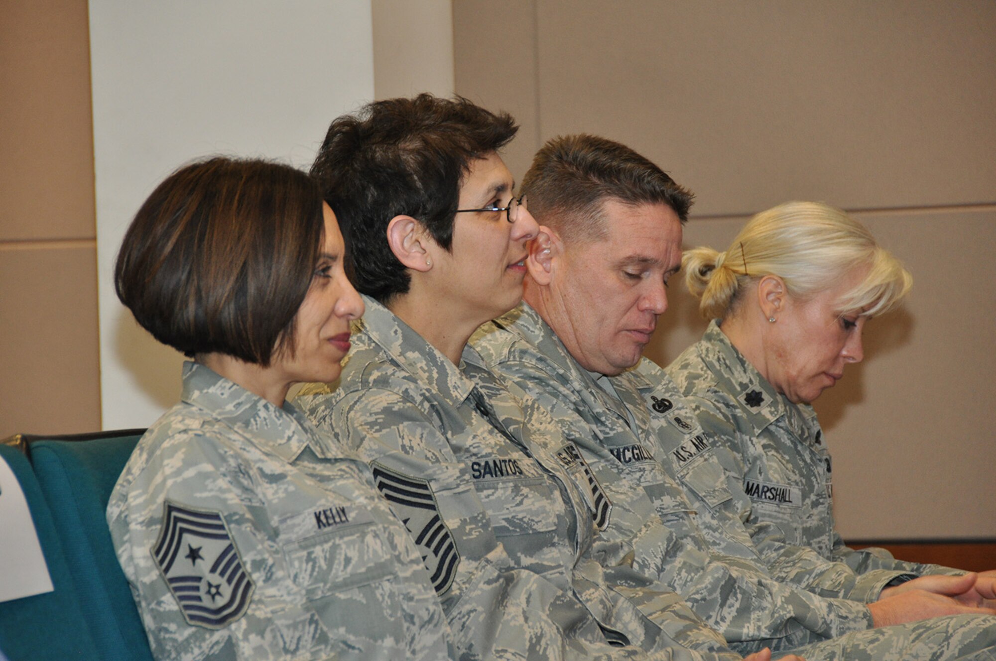 TRAVIS AIR FORCE BASE, Calif. -- Maj Erin Floersch receives the 349th Memorial Affairs Squadron guidon during an assumption of command ceremony officiated by Col. Stuart Toft, 349th Mission Support Group commander, Jan. 5.   Floersch officially took command of the squadron Nov. 2, 2013. (U.S. Air Force photo/Senior Master Sgt. Robert Wade)