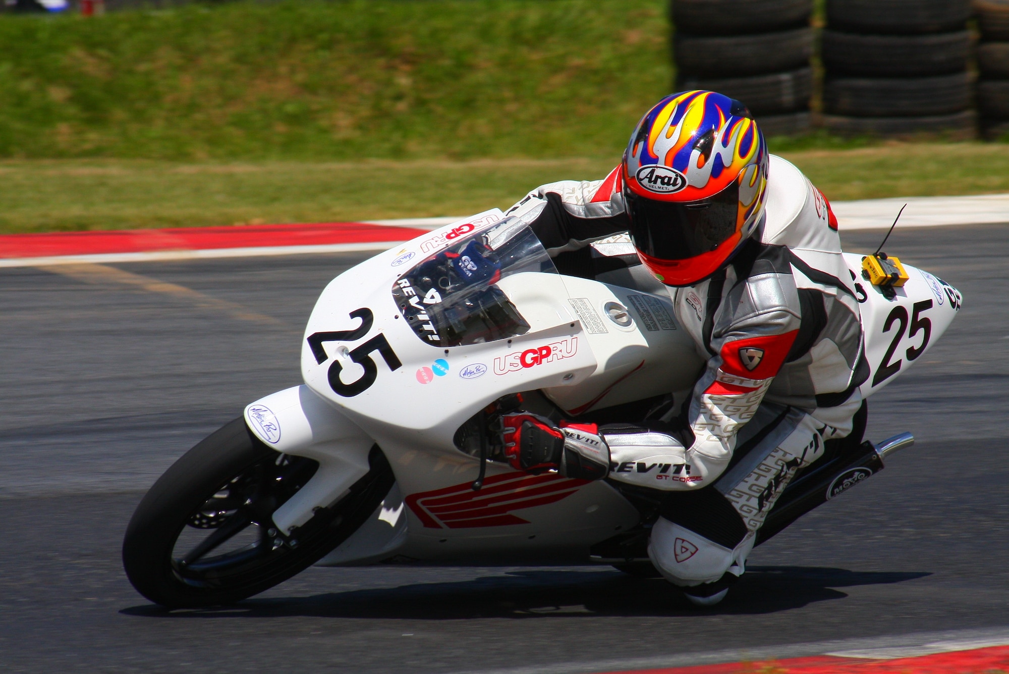Lt. Col. Stewart Aitken-Cade, Aerospace Data Facility-Colorado, maneuvers through a corner during a motorcycle race. Aitken-Cade has been riding motorcycles for nearly two decades and has won four national championships. (Courtesy Photo)