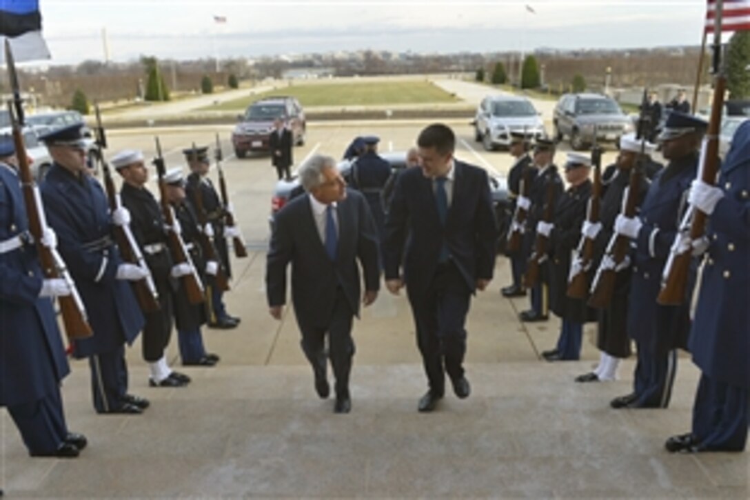 U.S. Defense Secretary Chuck Hagel welcomes Estonia's Defense Minister Urmas Reinsalu at the Pentagon, Jan. 6, 2014. During a meeting, Hagel praised Estonia's steadfast commitment to security in Afghanistan and supporting stability in Afghanistan post-2014.