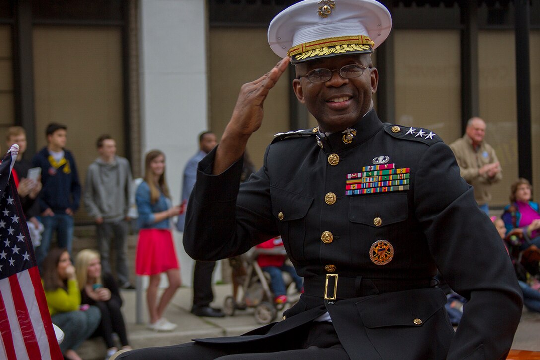 JACKSONVILLE, FLA. - Lt. Gen. Ronald L. Bailey, Deputy Commandant Plans, Polices, and Operations at Headquarters Marine Corps, salutes veterans watching the 2014 Gator Bowl Parade in Jacksonville, Fla., Dec. 31, 2013. Bailey along with Marines from Recruiting Station Jacksonville participated in the parade and other events hosted by the city celebrating the nationally televised game between the universities of Florida and Georgia. (Official Marine Corps photo by Lance Cpl. John-Paul Imbody)
