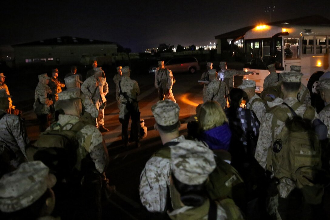 Marines and sailors with I Marine Expeditionary Force (Forward) get ready to board buses at Camp Pendleton, Calif., Jan. 4, 2014, as they prepare to deploy to Afghanistan. The unit, which is commanded by Brigadier Gen. Daniel D. Yoo, will be the last major Marine Corps unit to deploy to Afghanistan in support of Operation Enduring Freedom and will be operating out of Camp Leatherneck and Camp Bastion. The unit is scheduled to return at the end of 2014.