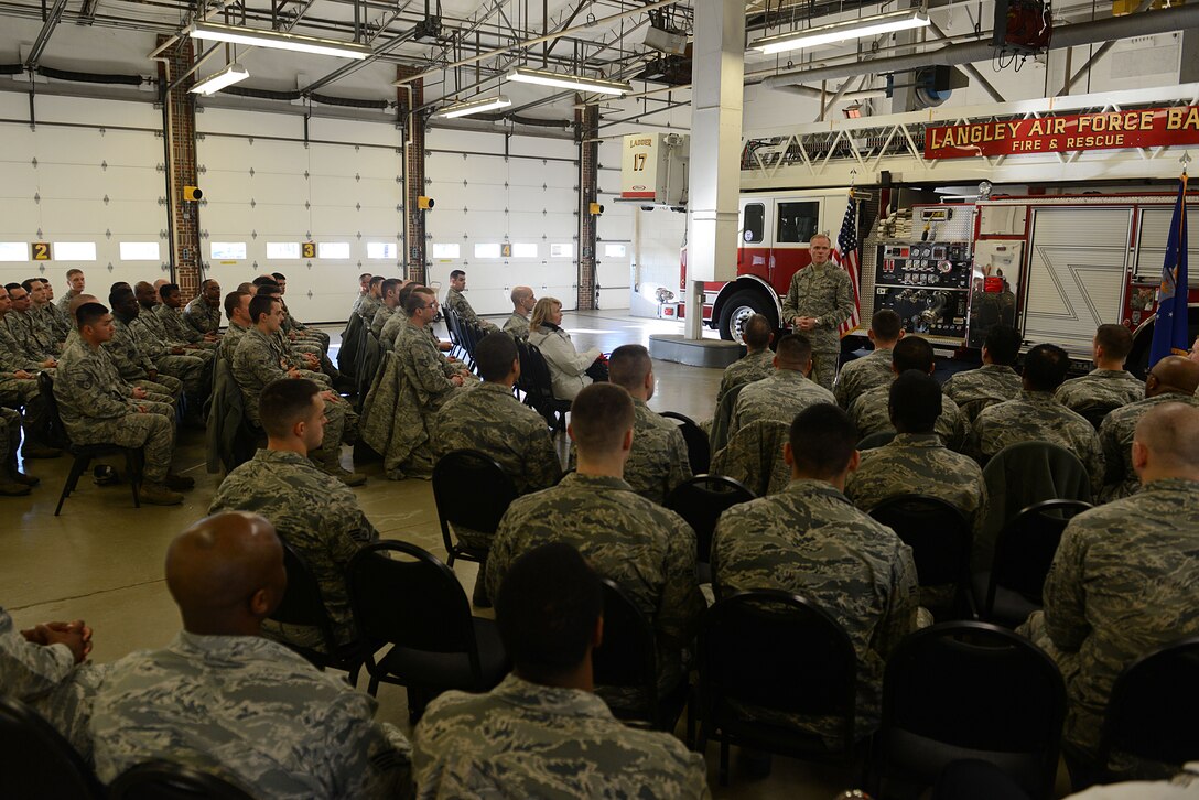 Members of the 633rd Civil Engineer Squadron speak with Chief Master Sgt. of the Air Force James A. Cody, during a visit at Langley Air Force Base, Va., Jan. 7, 2014. Cody visited multiple wings and discussed force management issues, budget concerns and the future of the enlisted force with Airmen. (U.S. Air Force photo by Airman 1st Class Kimberly Nagle/Released)