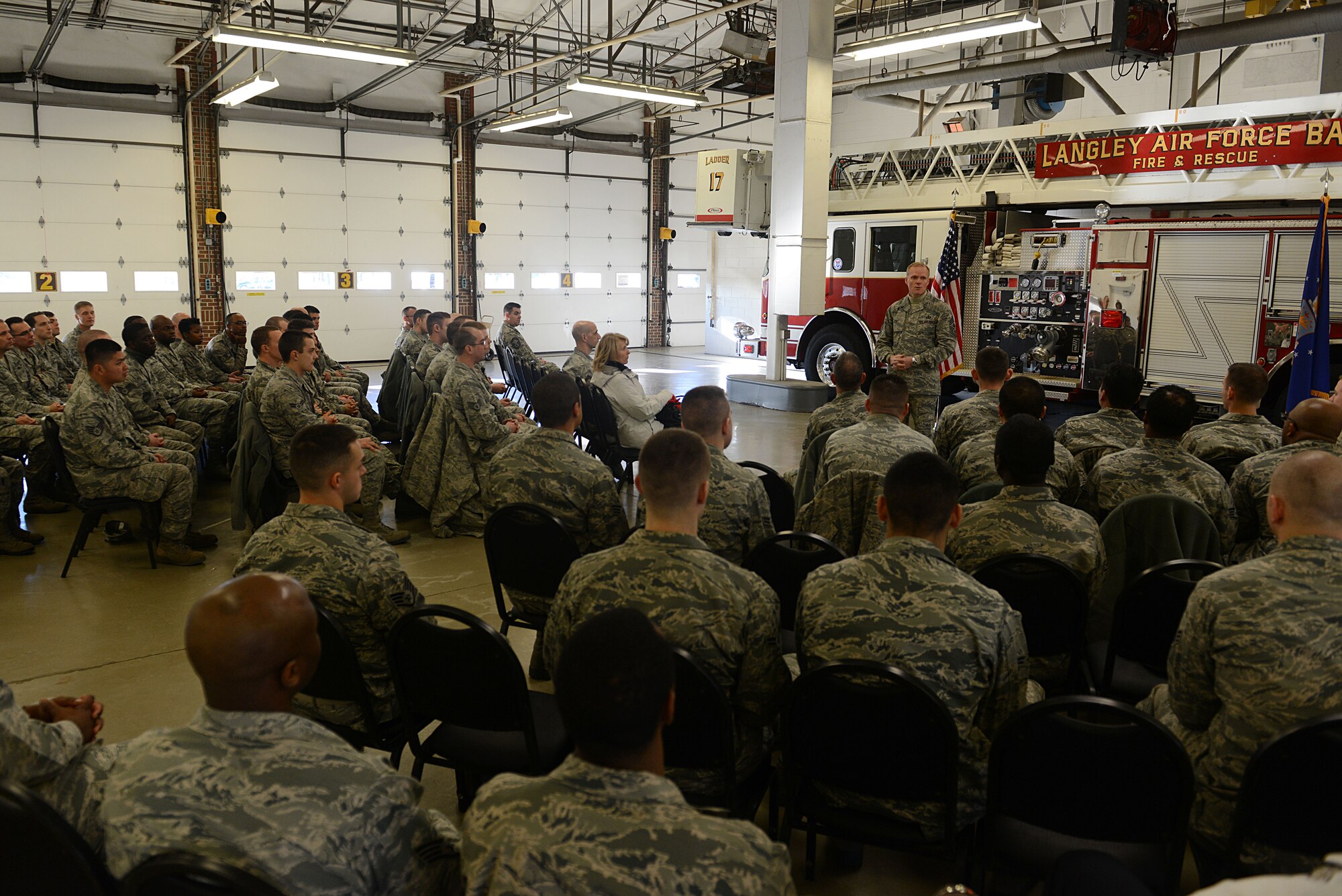 Members of the 633rd Civil Engineer Squadron speak with Chief Master Sgt. of the Air Force James A. Cody, during a visit at Langley Air Force Base, Va., Jan. 7, 2014. Cody visited multiple wings and discussed force management issues, budget concerns and the future of the enlisted force with Airmen. (U.S. Air Force photo by Airman 1st Class Kimberly Nagle/Released)