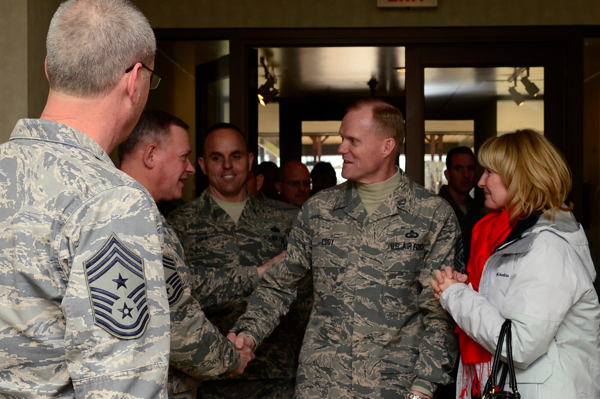 Chief Master Sgt. of the Air Force James A. Cody is greeted by enlisted leaders from Joint Base-Langley Eustis, Va., at the Crossbow Dining Facility during his tour of Langley Air Force Base, Va., Jan. 7, 2014. Cody visited multiple wings and discussed force management issues, budget concerns and the future of the enlisted force with Airmen. (U.S. Air Force photo/Airman 1st Class Areca T. Wilson/Released)