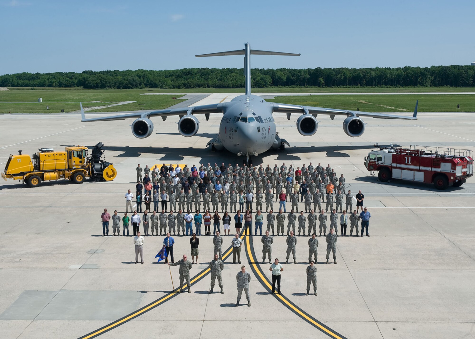 The 436th Civil Engineer Squadron poses for a group photo on the flight line May 18, 2012, at Dover Air Force Base, Del. The 436th CES won four Air Mobility Command awards and will go on to compete at the Air Force level. (U.S. Air Force photo/Adrian Rowan)