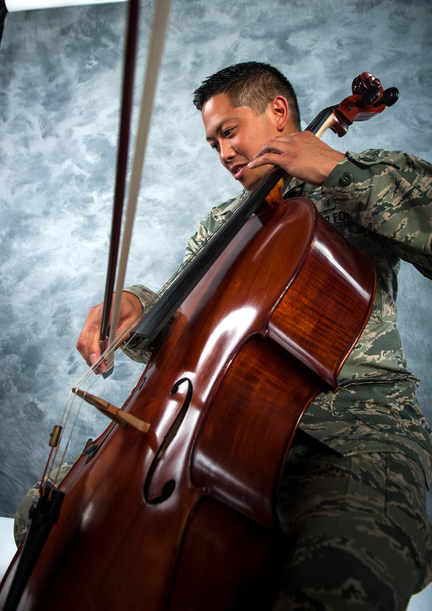 U.S. Air Force Staff Sgt. Joey Lee, 23d Aerospace Medicine Squadron public health technician, plays his cello at Moody Air Force Base, Ga., Sept. 12, 2013. Lee’s favorite style of music to play is classical, and he said he thinks the cello has the best solos. (U.S. Air Force photo by Senior Airman Jarrod Grammel/Released)
