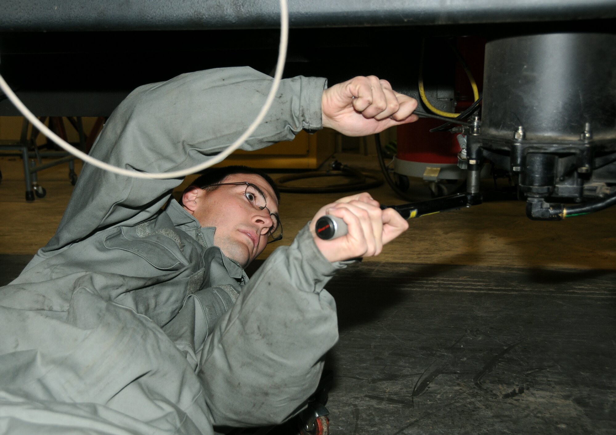 Airman 1st Class Mike Rockford of the 188th Logistics Readiness Squadron changes an air cleaner on an R-11 fueler. Rockford was selected as the 188th Fighter Wing’s Flying Razorback Spotlight for the month of January 2014. (U.S. Air National Guard photo by Senior Airman John Hillier/188th Fighter Wing Public Affairs)