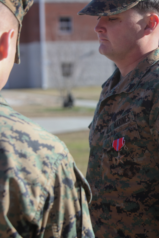 Corporal Joshua McKee, a Marine with Wounded Warrior Battalion, Wounded Warrior Regiment, and native of Lake Placid, Fla., received the Bronze Star Medal with combat distinguishing device during his award ceremony aboard Camp Lejeune, Dec. 27. McKee received the medal with a combat distinguishing device for his efforts while serving with 3rd Battalion, 8th Marine Regiment in support of Operation Enduring Freedom.