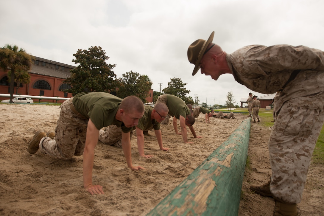 Sgt. Joseph Ramey, a drill instructor with Platoon 3078, conducts an incentive training session with recruits of Mike Company, 3rd Recruit Training Battalion, on July 24, 2013, on Parris Island, S.C. Drill instructors such as Ramey, 24, from Liberty, Ind., use these sessions to instill discipline and motivation in recruits while correcting minor disciplinary infractions. Mike Company is scheduled to graduate Oct. 4, 2013. Parris Island has been the site of Marine Corps recruit training since Nov. 1, 1915. Today, approximately 20,000 recruits come to Parris Island annually for the chance to become United States Marines by enduring 13 weeks of rigorous, transformative training. Parris Island is home to entry-level enlisted training for 50 percent of males and 100 percent for females in the Marine Corps. (Photo by Cpl. Caitlin Brink)