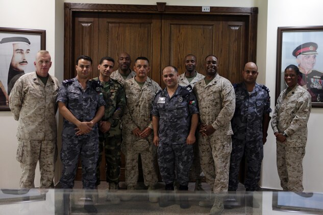 Senior staff noncommissioned officers from U.S. Marine Corps Forces Central Command (Forward) and senior noncommissioned officers from the Royal Jordanian Armed Forces pose for a picture after taking a tour of the Royal Naval Base, Aqaba, Jordan, June 12, 2013. The tour was part of Exercise Eager Lion 2013.