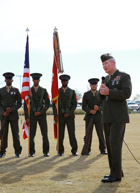 Lieutenant Gen. John Toolan, commanding general of I Marine Expeditionary Force, addresses the audience during an award ceremony for Staff Sgt. Timothy Williams, a section leader with 1st Reconnaissance Battalion, held at Camp Las Flores, Marine Corps Base Camp Pendleton, Calif., Jan. 7, 2014. During the ceremony, the Silver Star Medal and Purple Heart were awarded to Williams, a native of Hudson, Mich. Williams was recognized for his heroic actions in Afghanistan when he maintained a tactical advantage while being ambushed by a larger enemy force. Williams helped save the lives of multiple Marines and destroyed several enemy positions during the 10 hour attack. (U.S Marine Corps photo by Lance Cpl. Jonathan Boynes/released)
