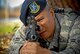 U.S. Air Force Airman 1st Class William DeGuzman, 129th Security Forces specialist, performs integrated base defense measures during a training scenario at the 129th Rescue Wing, Moffett Federal Airfield, Calif., Nov. 14, 2013.  (U.S. Air National Guard photo by Tech. Sgt. Ray Aquino/RELEASED)