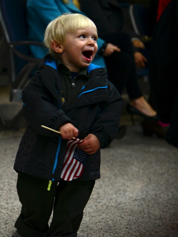Dylan, son of Capt. Daniel Prescott, 15th Airlift Squadron pilot, waits for his father Jan. 6, 2014, at Joint Base Charleston — Air Base, S.C. More than 80 Airmen from the 15th AS returned from a 60-day deployment to Southwest Asia. (U.S. Air Force photo/Airman 1st Class Clayton Cupit)