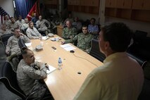 Thomas J. Brinegar, the Logistics Preposition Analyst with U.S. Marine Corps Forces Central Command in Tampa, Fla., talks to Marines with MARCENT (Forward) during a maritime prepositioning force seminar at Naval Support Activity Bahrain Aug. 21, 2013. Brinegar, along with Marines and sailors from around the globe, came together to provide Bahrain-stationed Marines with critical information for executing MPF missions.