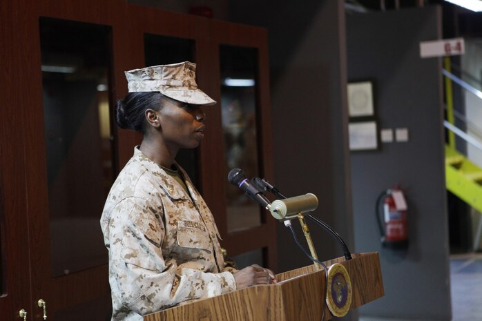 Maj. Melanie R. Bell-Carter, of Cleveland Miss., gives her parting remarks as the commanding officer of Headquarters Company, United States Marine Corps Forces Central Command (Forward).  Bell-Carter was replaced by Maj. Sally A. Falco, a Detroit native, Aug. 15 in a change of a command ceremony.  
