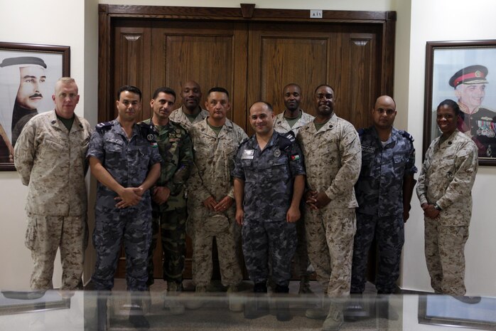 Senior staff noncommissioned officers from U.S. Marine Corps Forces Central Command (Forward) and senior noncommissioned officers from the Royal Jordanian Armed Forces pose for a picture after taking a tour of the Royal Naval Base, Aqaba, Jordan, June 12, 2013. The tour was part of Exercise Eager Lion 2013.