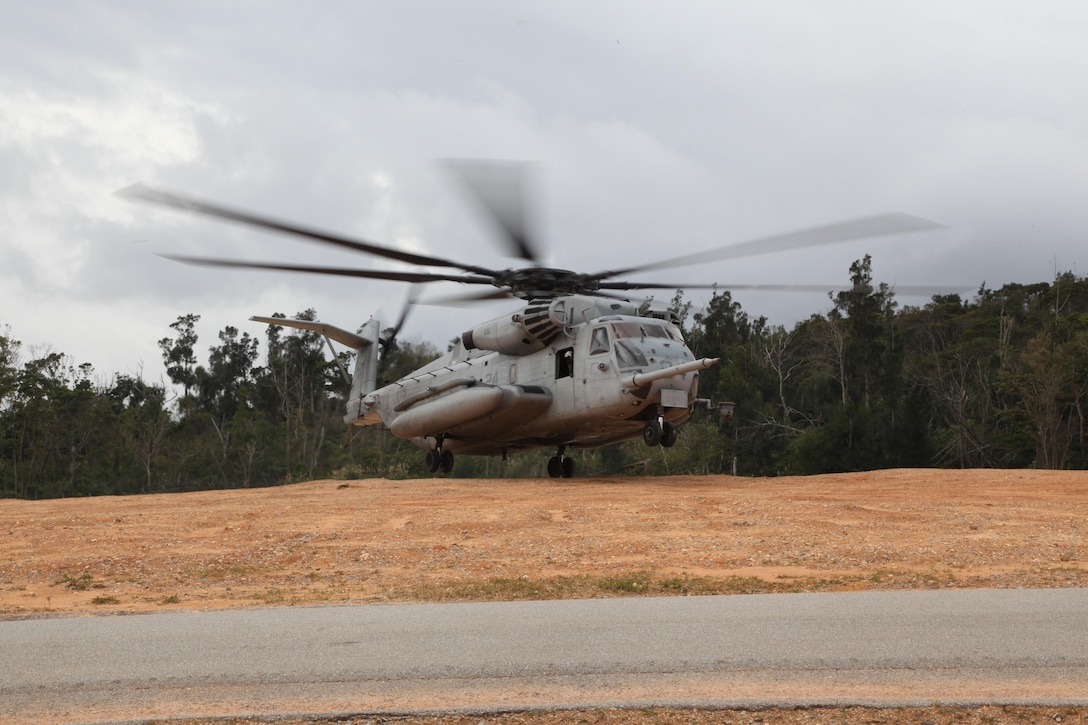 A CH-53E Super Stallion touches down at Landing Zone Falcon Jan. 3 during confined area landing training in the Central Training Area. The helicopter and crew are with Marine Heavy Helicopter Squadron 463, currently assigned to Marine Medium Tiltrotor Squadron 265 (Reinforced), 31st Marine Expeditionary Unit, III Marine Expeditionary Force. (U.S. Marine Corps photo by Lance Cpl. David N. Hersey/Released)
