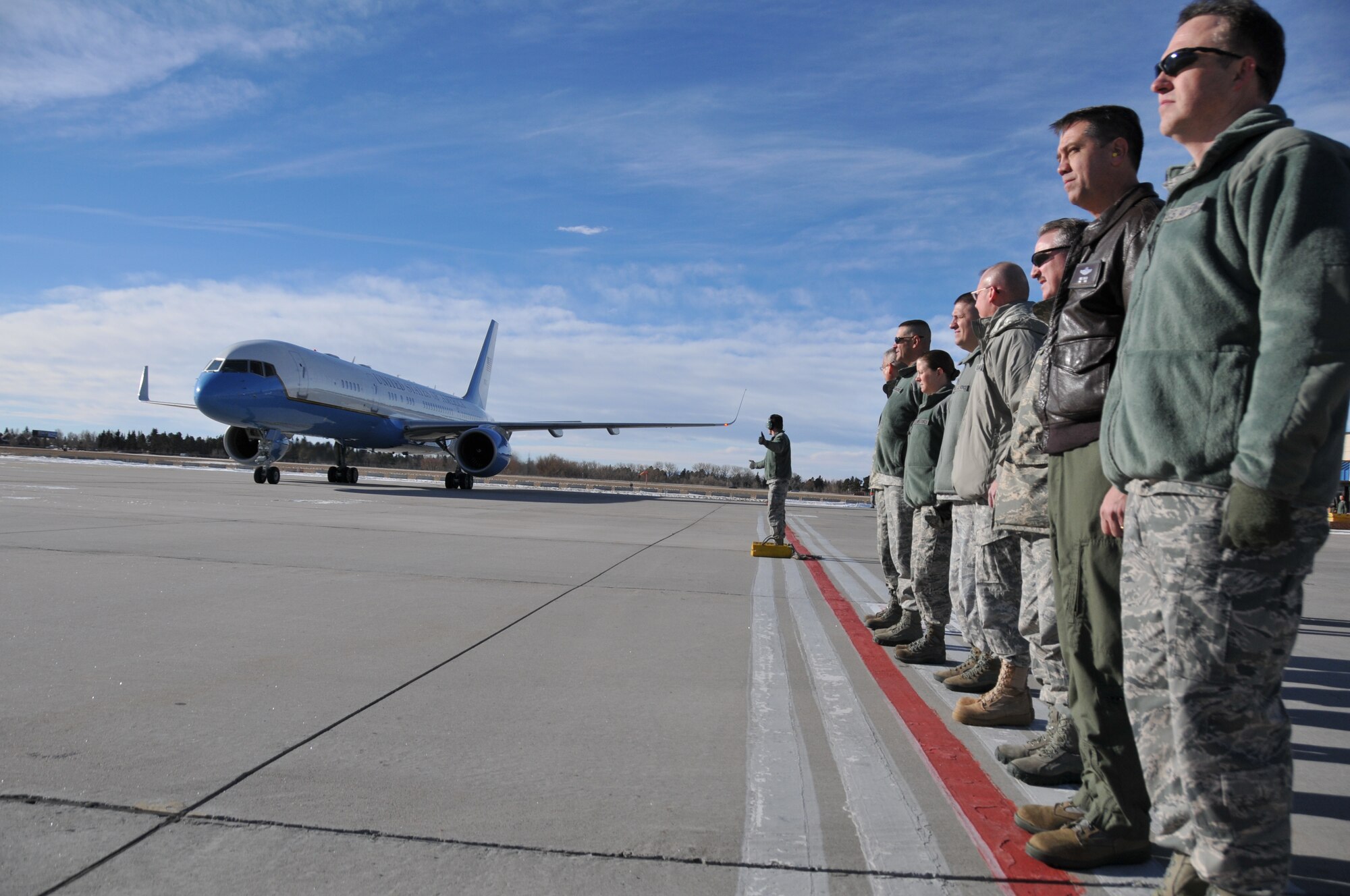 Leaders of the Wyoming National Guard and 90th Missile Wing await the arrival of Defense Secretary Chuck Hagel at the Wyoming Air National Guard Base, Cheyenne, Wyo., Jan. 9, 2014. Hagel visited military facilities in Wyoming to thank military members for their service. (U.S. Air National Guard photo by Capt. Rusty Ridley)