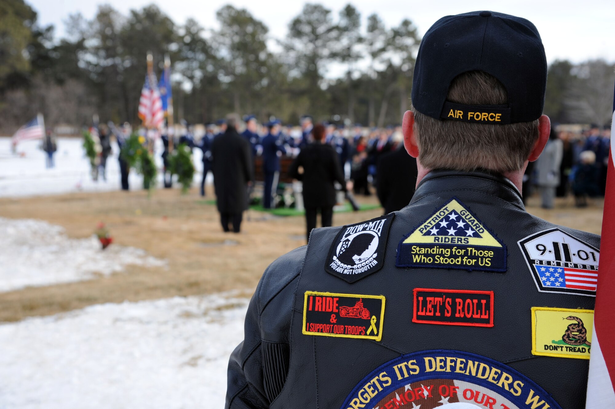U.S. AIR FORCE ACADEMY, Colo. – A Patriot Guard rider looks on during the interment ceremony of Capt. David Lyon, 21st Logistics Readiness Squadron, Jan. 8. Lyon was killed in action Dec. 27 after the enemy attacked his convoy in Afghanistan. (U.S. Air Force photo/SSgt J. Aaron Breeden)