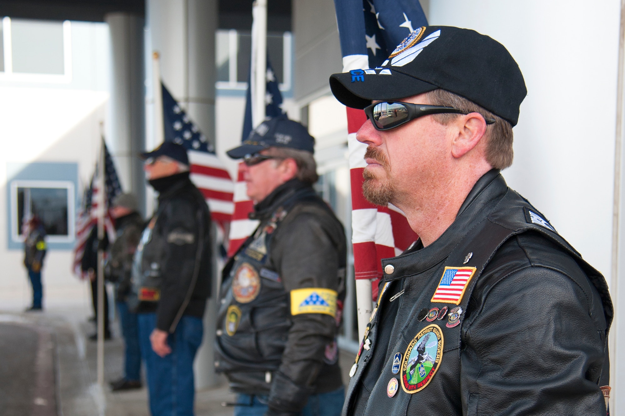 COLORADO SPRINGS, Colo. – Patriot Guard riders line the street Jan. 8 as friends and family enter the funeral service for Capt. David Lyon, 21st Logistics Readiness Squadron director of operations. Lyon was killed in action Dec. 27 after the enemy attacked his convoy in Afghanistan. (U.S. Air Force photo/Craig Denton)