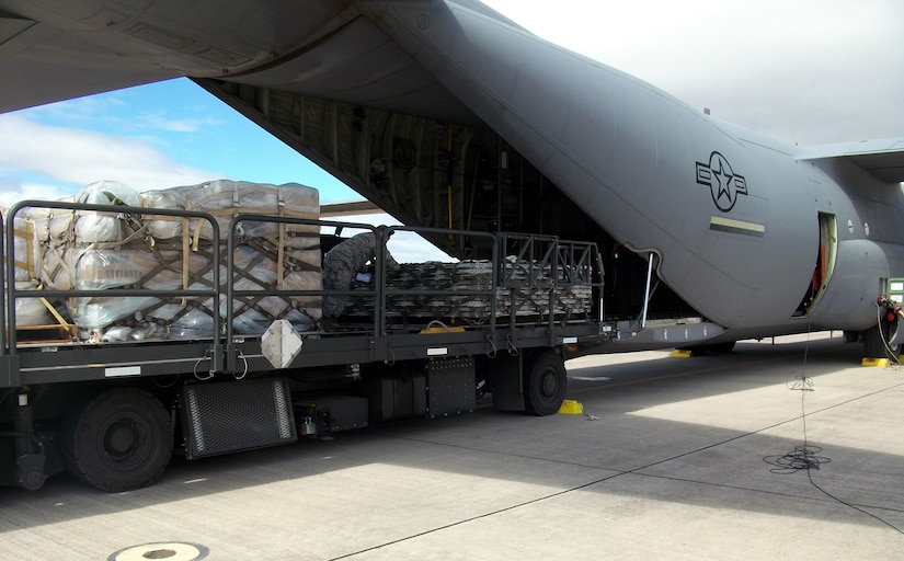 Members of Joint Task Force-Bravo's 612th Air Base Squadron offload, load, and refuel at C-130 Hercules aircraft at Soto Cano Air Base, Honduras, Jan. 8, 2014. The C-130 makes regular flights to Soto Cano to deliver supplies to the base, as well as to deliver items back to the United States. The 612 ABS provides a day and night, all-weather, C-5 capable airfield, base operations support, air traffic control, weather, crash and fire rescue, logistics and base civil engineers to support theater-wide USSOUTHCOM operations. (U.S. Air Force photos by Tech. Sgt. Stacy Rogers)
 