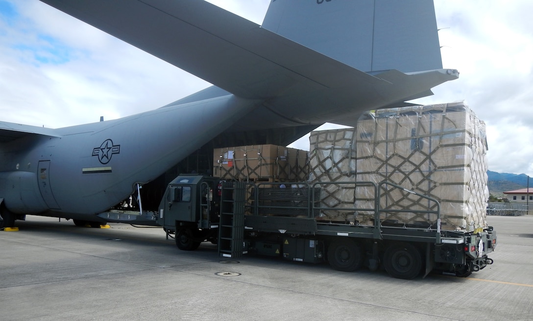 Members of Joint Task Force-Bravo's 612th Air Base Squadron offload, load, and refuel at C-130 Hercules aircraft at Soto Cano Air Base, Honduras, Jan. 8, 2014. The C-130 makes regular flights to Soto Cano to deliver supplies to the base, as well as to deliver items back to the United States. The 612 ABS provides a day and night, all-weather, C-5 capable airfield, base operations support, air traffic control, weather, crash and fire rescue, logistics and base civil engineers to support theater-wide USSOUTHCOM operations. (U.S. Air Force photos by Tech. Sgt. Stacy Rogers)
 