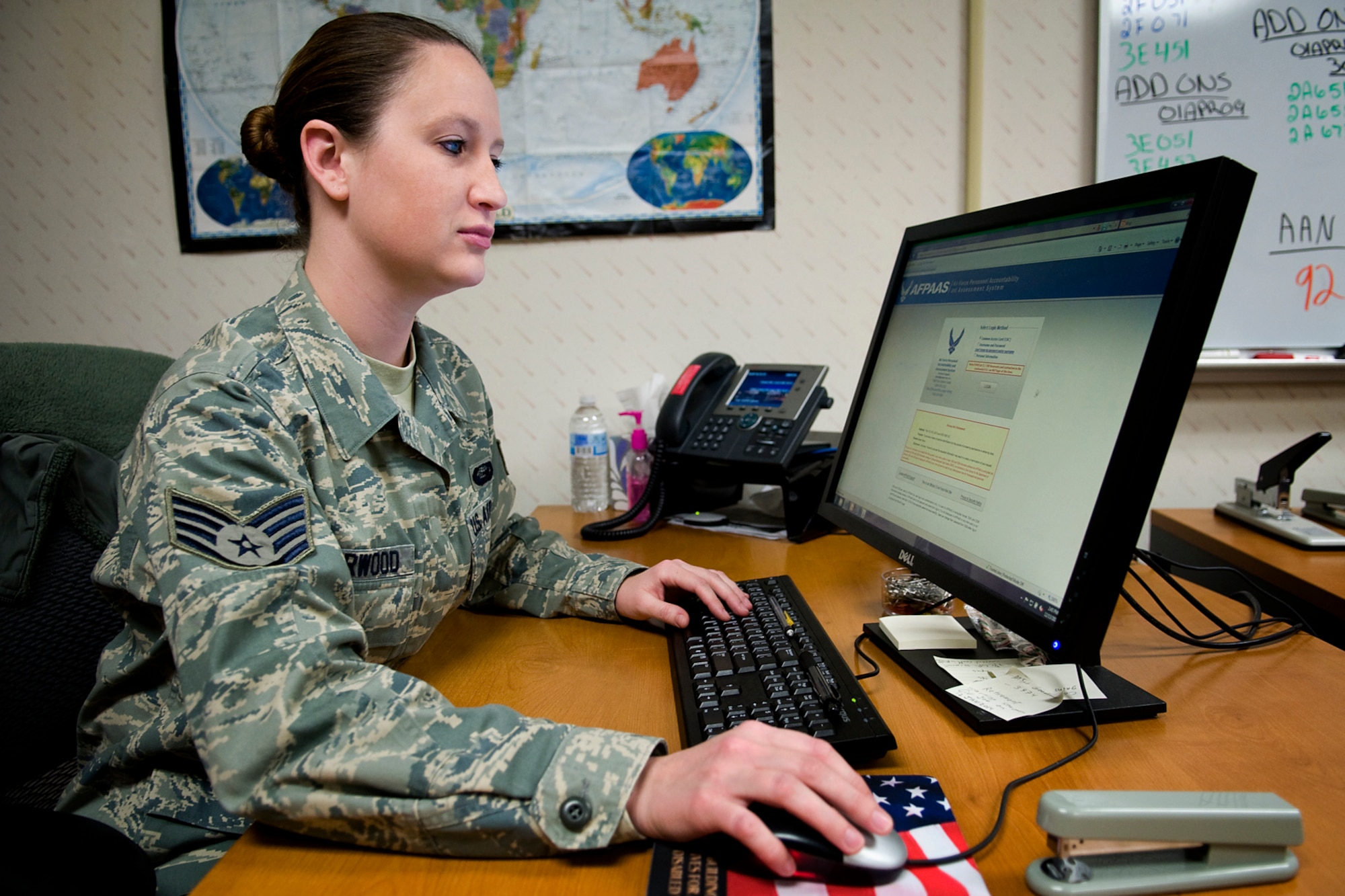 Staff Sgt. Erica Sherwood, 434th Force Support Squadron personnel specialist, uses the Air Force Personnel Accountability and Assessment System at Grissom Air Reserve Base, Ind., Dec. 13, 2013. AFPAAS allows the Air Force to account for all members and dependents affected by a disaster by using one system. (U.S. Air Force photo/Tech. Sgt. Mark R. W. Orders-Woempner)
