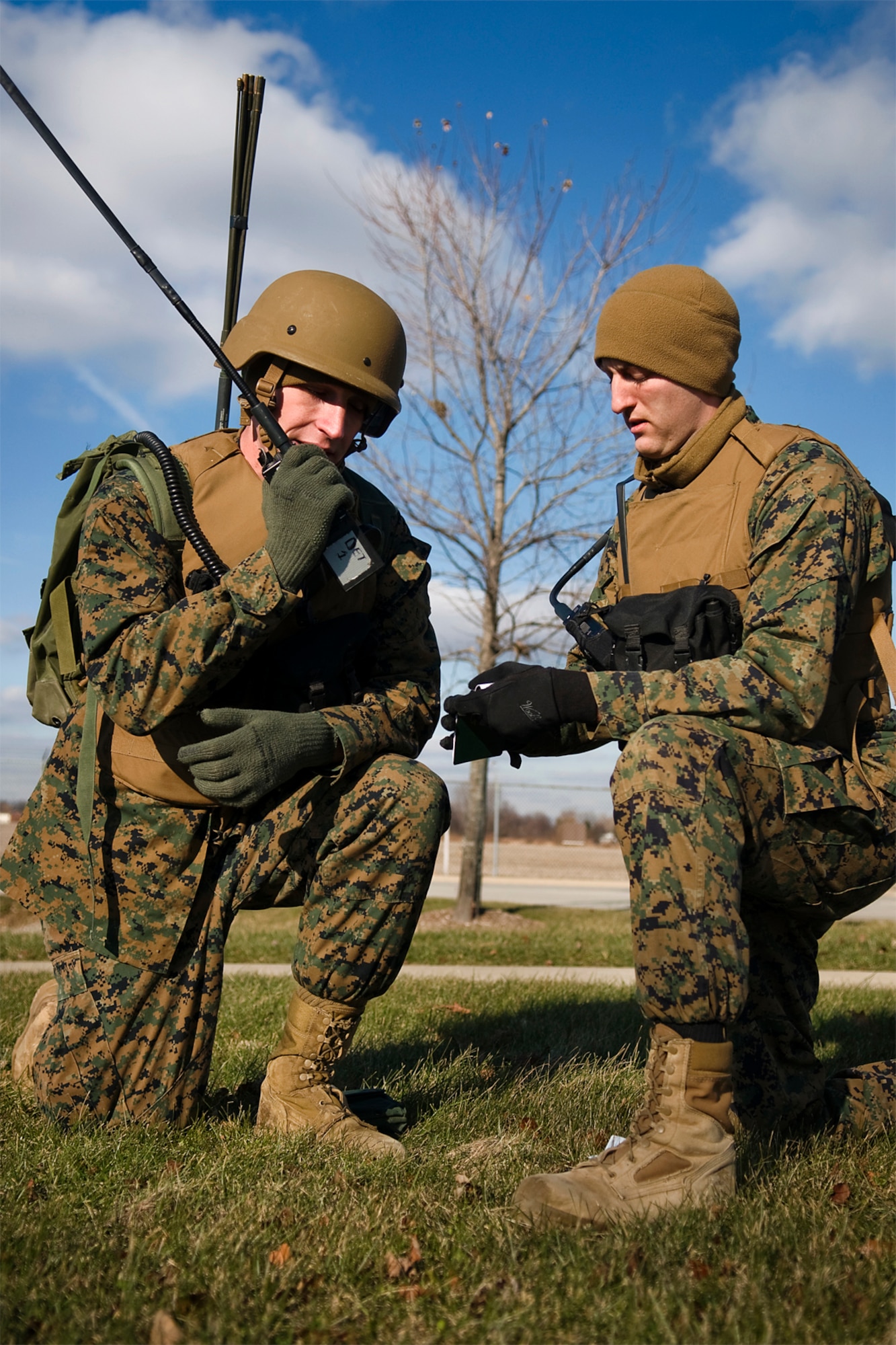 Lance Cpl. Charles Sansone, left, and Cpl. Austin Bailey, both field radio operators with Detachment One, Communication Company, Combat Logistics Regiment 45, 4th Marine Logistics Group, are on patrol during a communications exercise held at Grissom Air Reserve Base, Ind., Dec. 7. During the two-day exercise, Grissom Marines worked 24-hours-a-day to establish radio and data contact with fellow Marines in Greensboro, N.C. (U.S. Air Force photo/Tech. Sgt. Mark R. W. Orders-Woempner) 
