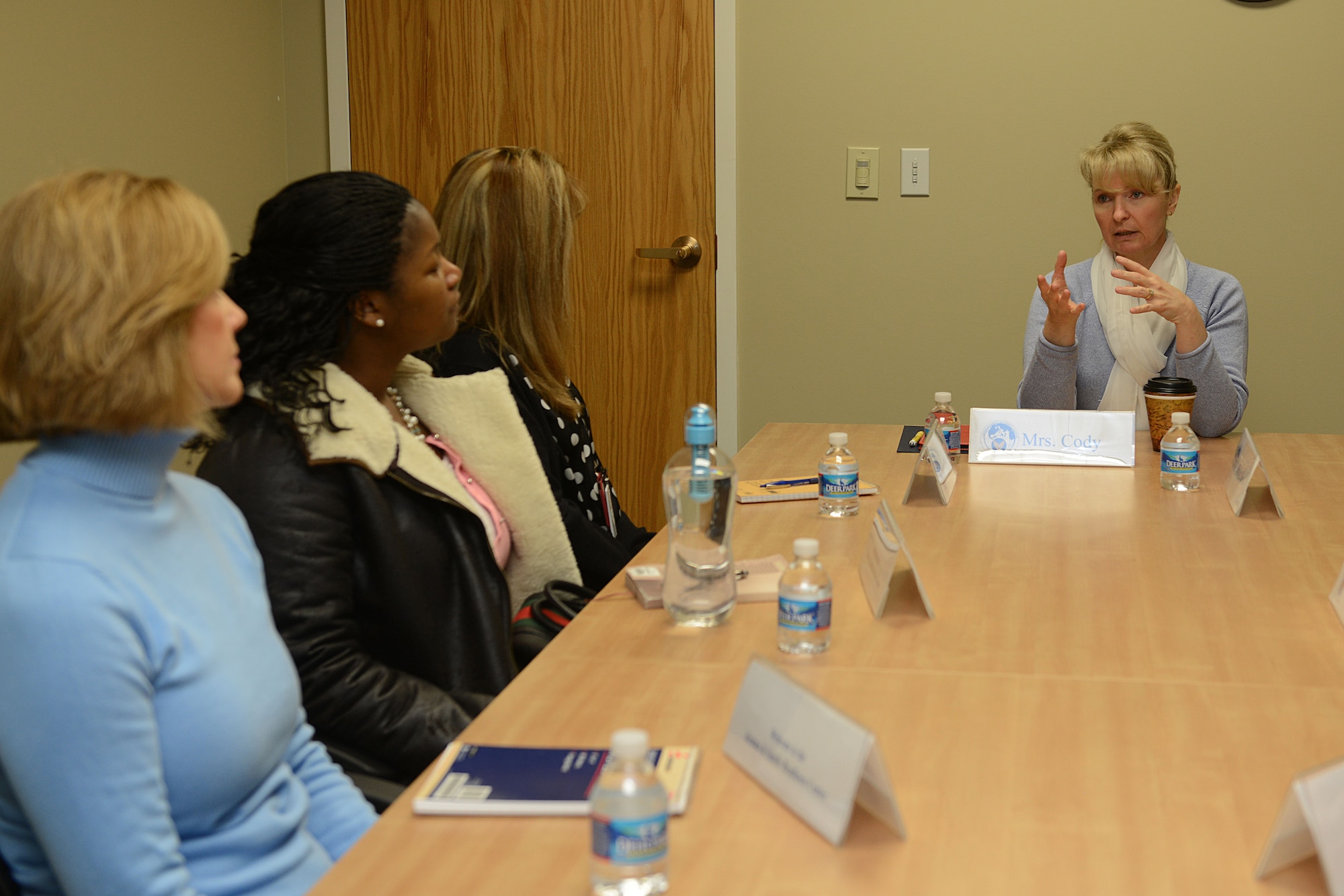 Athena Cody, wife of Chief Master Sgt. of the Air Force James A. Cody, speaks with military spouses at the Langley Airman and Family Readiness Center at Langley Air Force Base, Va. Jan. 8, 2014. Cody visited multiple wings and discussed force management issues, budget concerns and the future of the enlisted force with Airmen. (U.S. Air Force photo by Airman 1st Class Kimberly Nagle/Released) 