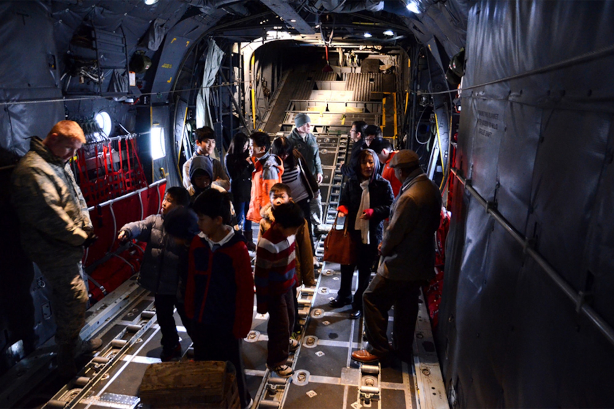 North Atlanta Chinese Baptist Church students tour the cargo area of a C-130 aircraft at Dobbins Air Reserbve Base, Ga. during a base tour Jan. 6. (U.S. Air Force photo/Brad Fallin)