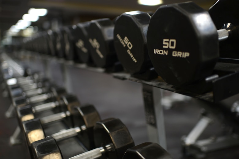 SPANGDAHLEM AIR BASE, Germany â Dumbbell weights rest on a weight rack inside the Skelton Memorial Fitness Center Jan. 7, 2014. The weight room will close Jan. 9, 2014, as part of the movement of equipment in to the new Fitness Center. (U.S. Air Force photo by Senior Airman Gustavo Castillo/Released