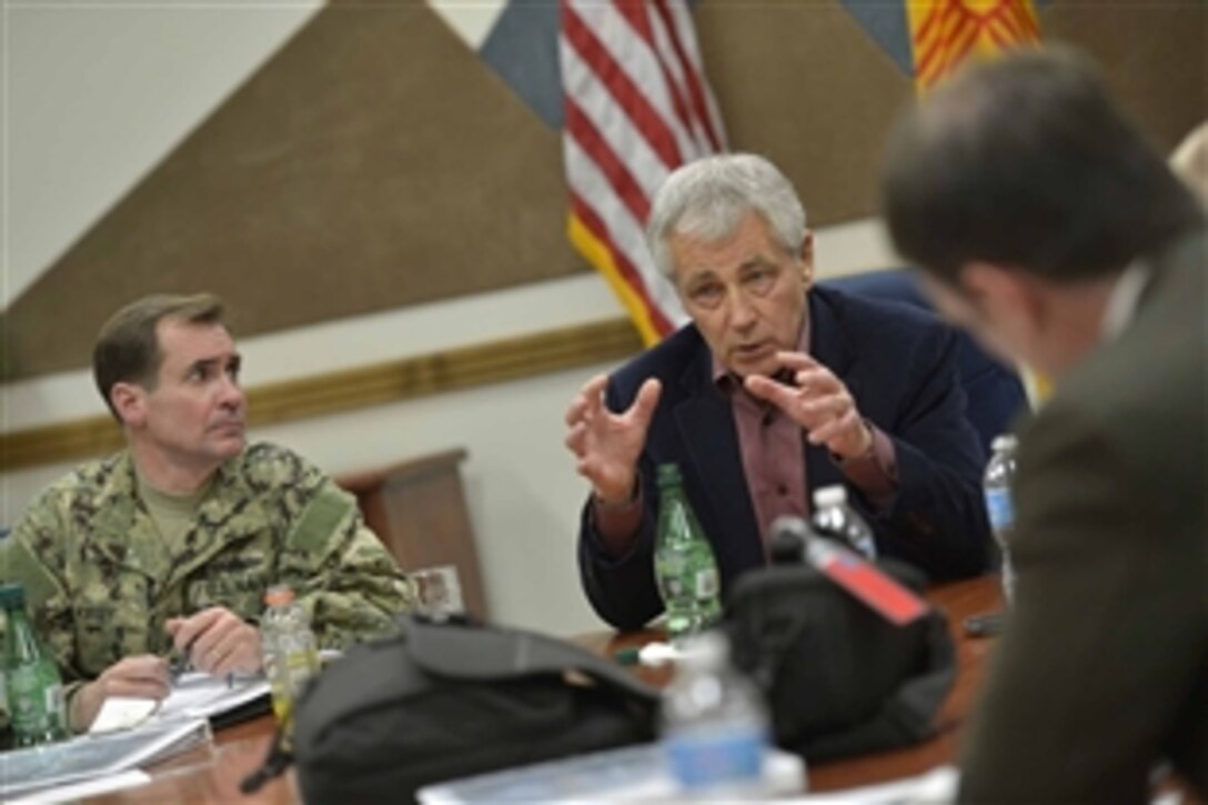 Defense Secretary Chuck Hagel answers questions from reporters as he wraps up his visit to Sandia National Laboratories in Albuquerque, N.M., Jan 8, 2014. 