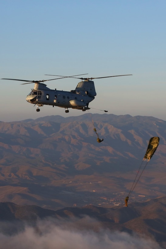 U.S. Marines with Air Delivery Platoon, Landing Support Company, Combat Logistics Regiment 17, 1st Marine Logistics Group, conduct jump training aboard a CH-46E Sea Knight with Marine Medium Helicopter Training Squadron 164 (HMMT-164) aboard Camp Pendleton, Calif., January 8, 2014. Air Delivery Platoon conducts training jumps to maintain the unit's deployment readiness. (U.S. Marine Corps photo by Lance Cpl. Lauren Falk/ Released)