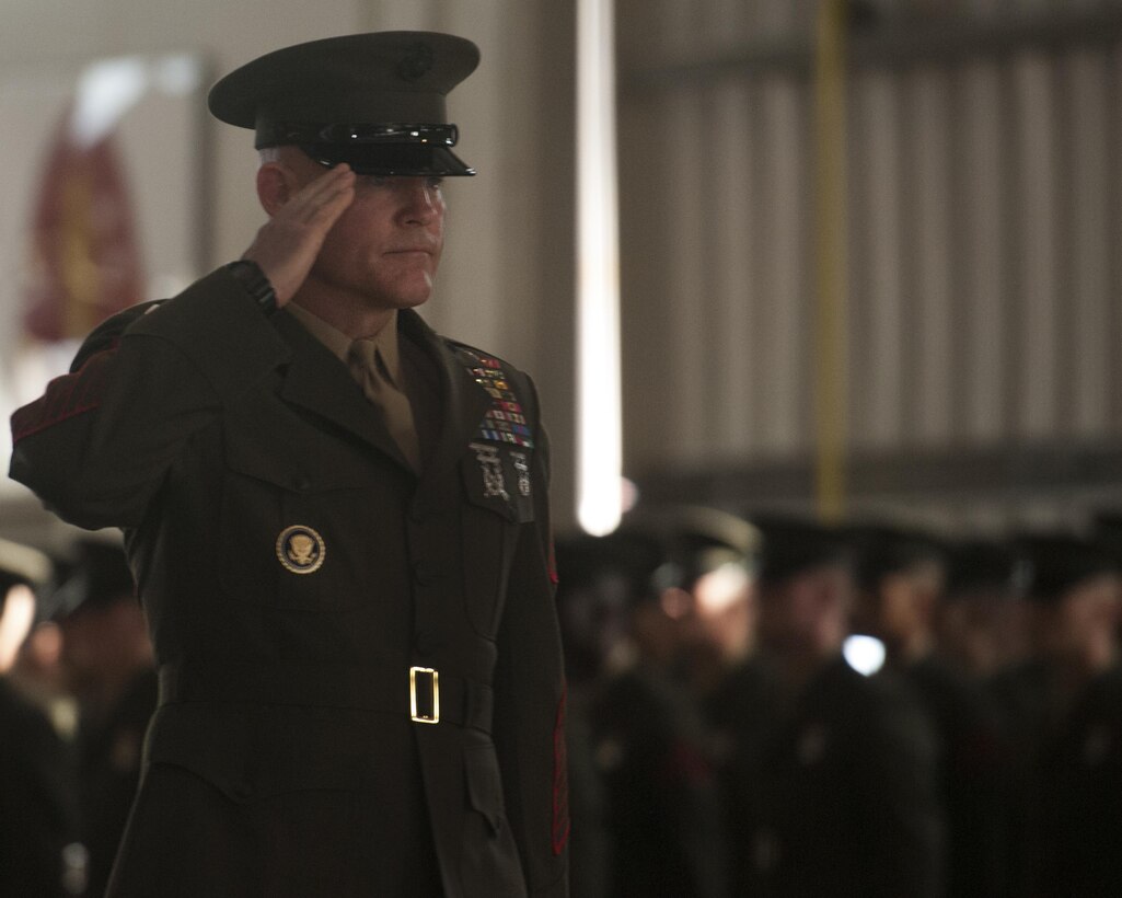 PARRIS ISLAND, S.C. – Sgt. Maj. Michael Barrett, sergeant major of the Marine Corps, salutes the platoons of Company H. during a pass and review at a graduation ceremony here Jan. 10, 2014. Barrett is the 17th sergeant major of the Marine Corps and was the guest of honor for the graduation of more than 400 newly-minted Marines. (U.S. Marine Corps Photo by Lance Cpl. Stanley Cao/released) 