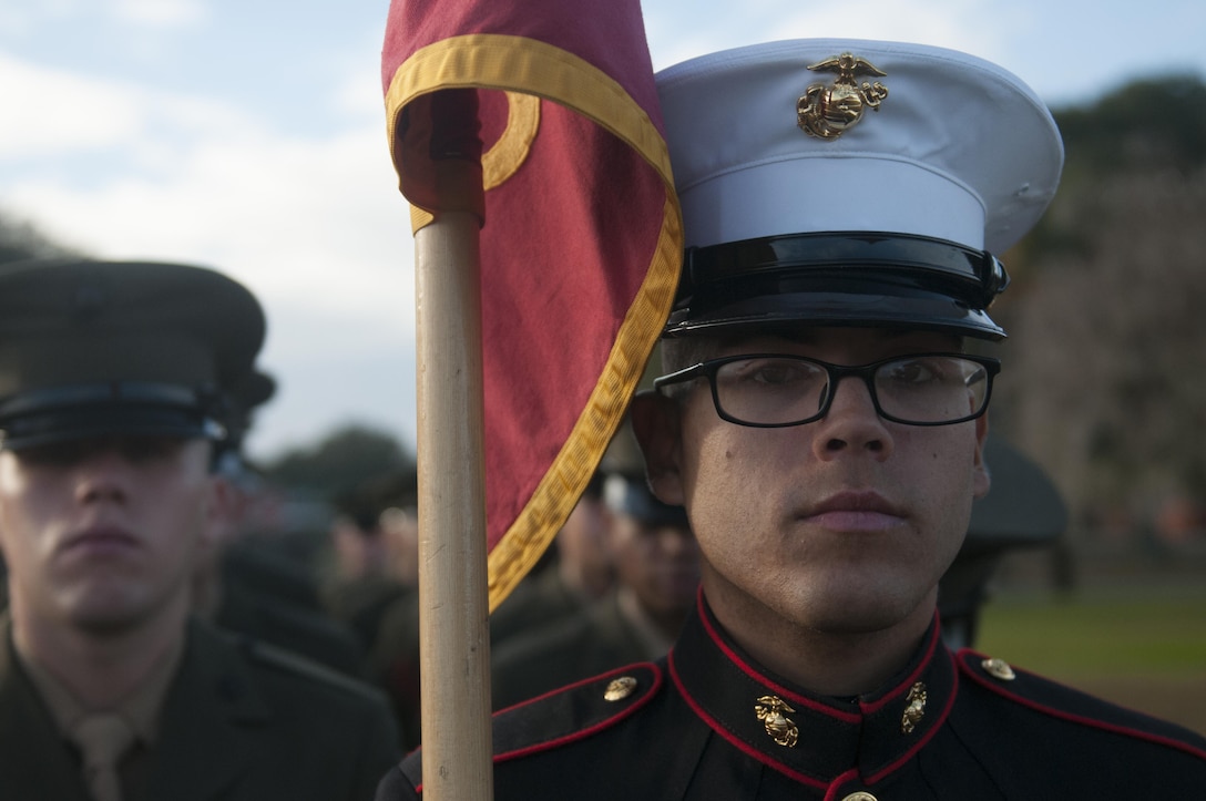 PARRIS ISLAND - S.C. - Pfc. Brandon Acevedo, honor graduate for platoon 2006, stands at attention before graduation here, Jan. 10, 2014. Acevedo, a native of Lehigh Acres, Fla., was recruited by Sgt. Cory R. Smith, a recruiter from Recruiting Substation Fort Myers, Recruiting Station Ft. Lauderdale. Acevedo attained the highest combined physical fitness and combat fitness score in Company H. (U.S. Marine Corps photo by Lance Cpl. Stanley Cao/released)
