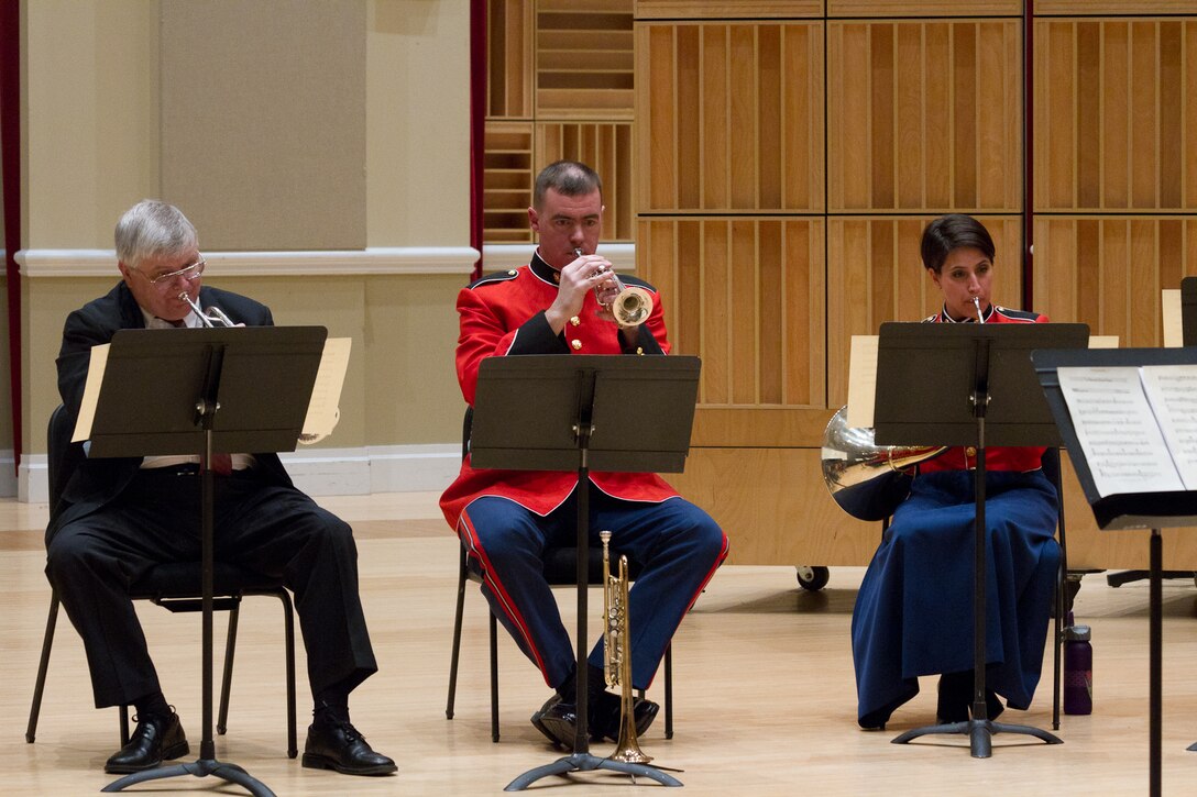 A Marine Band Brass Quintet and a brass quintet from the National Symphony Orchestra perform a joint concert on Jan. 9, 2014, in John Philip Sousa Band Hall in Washington, D.C. (U.S. Marine Corps photo by Gunnery Sgt. Amanda Simmons/released)