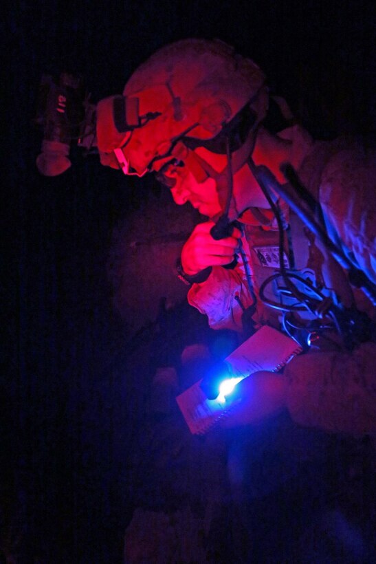U.S. Marines assigned to Battalion Landing Team 1/4, 13th Marine Expeditionary Unit (MEU) conduct a radio check during a tactical recovery of aircraft and personnel (TRAP) training exercise at Camp Lemonnier, Djibouti, Jan. 7, 2014. The 13th MEU is deployed with the Boxer Amphibious Ready Group as a theater reserve and crisis response force throughout the U.S. 5th Fleet area of responsibility. (U.S. Marine Corps photo by Lance Cpl. Lonzo-Grei D. Thornton, 13th Marine Expeditionary Unit Combat Camera/Released)
