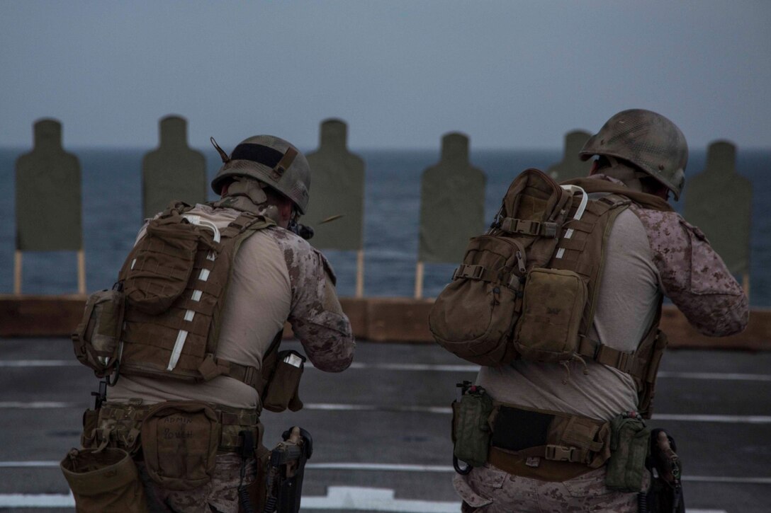 ARABIAN GULF (Jan. 8, 2014) - U.S. Marines assigned to Maritime Raid Force, 13th Marine Expeditionary Unit, conduct a deck shoot on the flight deck aboard USS New Orleans (LPD 18) Jan. 9, 2014. The 13th MEU is deployed with the Boxer Amphibious Ready Group as a theater reserve and crisis response force throughout the U.S. 5th Fleet area of responsibility. (U.S. Marine Corps photo by Sgt. Ammon W. Carter 13th Marine Expeditionary Unit Combat Camera/Released)