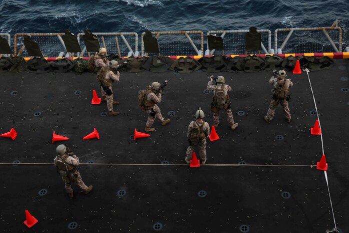 U.S. Marines assigned to Reconnaissance Platoon, Battalion Landing Team 1/4, 13th Marine Expeditionary Unit (MEU) conduct live fire training aboard the USS Boxer (LHD 4) at sea Jan. 8, 2014. The 13th MEU is deployed with the Boxer Amphibious Ready Group as a theater reserve and crisis response force throughout the U.S. 5th Fleet area of responsibility. (U.S. Marine Corps photo by Cpl. David Gonzalez, 13th Marine Expeditionary Unit Combat Camera/Released)