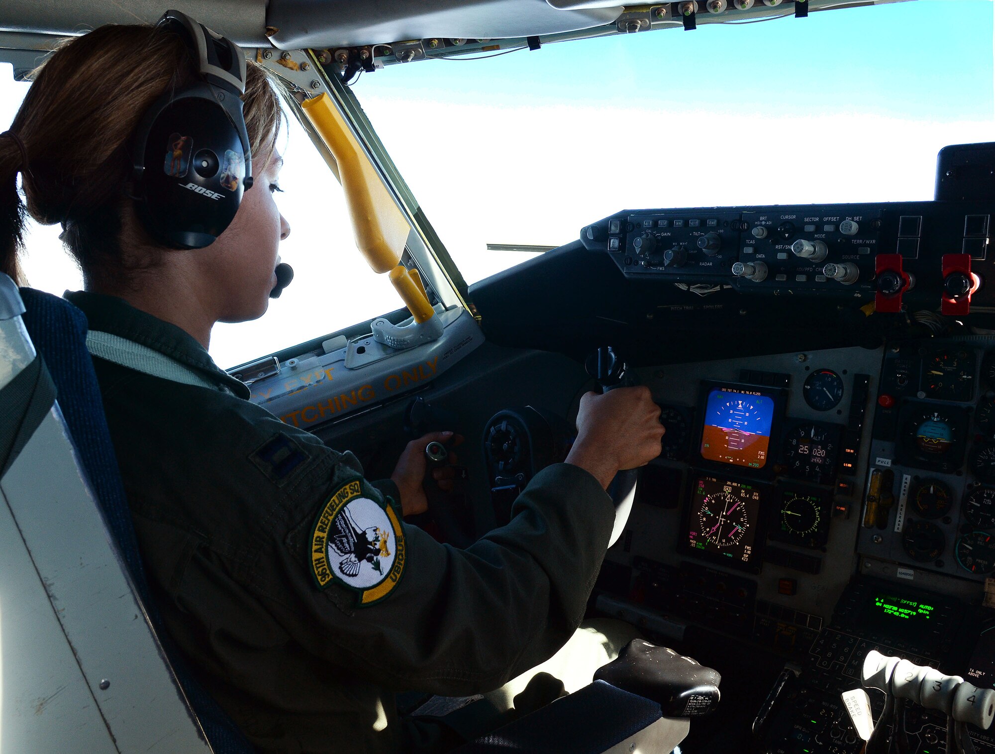 Capt. Nikita Wetherbee, 96th Air Refueling Squadron, coordinates with air traffic control to position her KC-135 Stratotanker while taking off from Joint Base Pearl Harbor-Hickam, Hawaii, Jan. 10, 2014. Wetherbee, a KC-135 pilot, and her crew were participants in the Inaugural Total Force Integration Warrior Day, a training event that tested the cooperation and capabilities of multiple base agencies. The training highlighted the importance of integrating operations of active duty, Hawaii National Guard and Air Force Reserve units. (U.S. Air Force photo/Staff Sgt. Alexander Martinez)