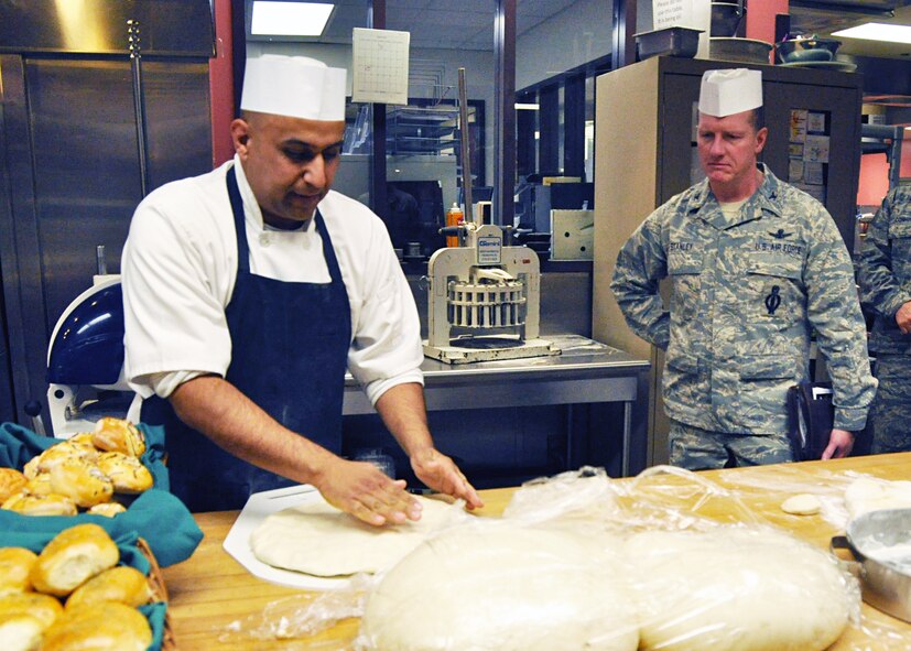 Col. Robert W. Stanley, 341st Missile Wing commander, and other Commander in Chief Installation Excellence Award team members tour DGMC's dining facility kitchen Jan. 7 where all the patients and staff members of the hospital receive their food. (U.S. Air Force photo/SMSgt Robert Wade)