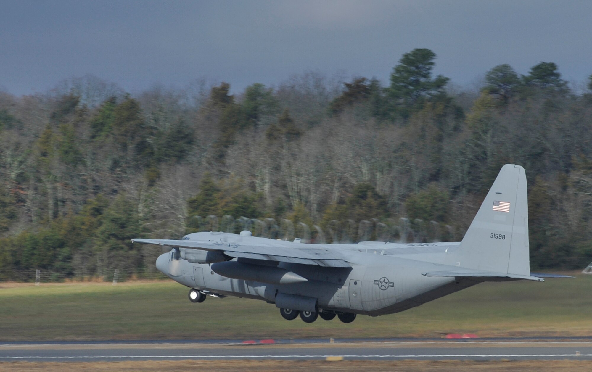 A 50th Airlift Squadron C-130H takes off Dec. 14, 2013, at Little Rock Air Force Base, Ark. The 50th AS and the 22nd Air Force Det. 1 are currently integrating in an anticipation of active association by the close of fiscal year 2014. (U.S. Air Force photo by Staff Sgt. Caleb Pierce)