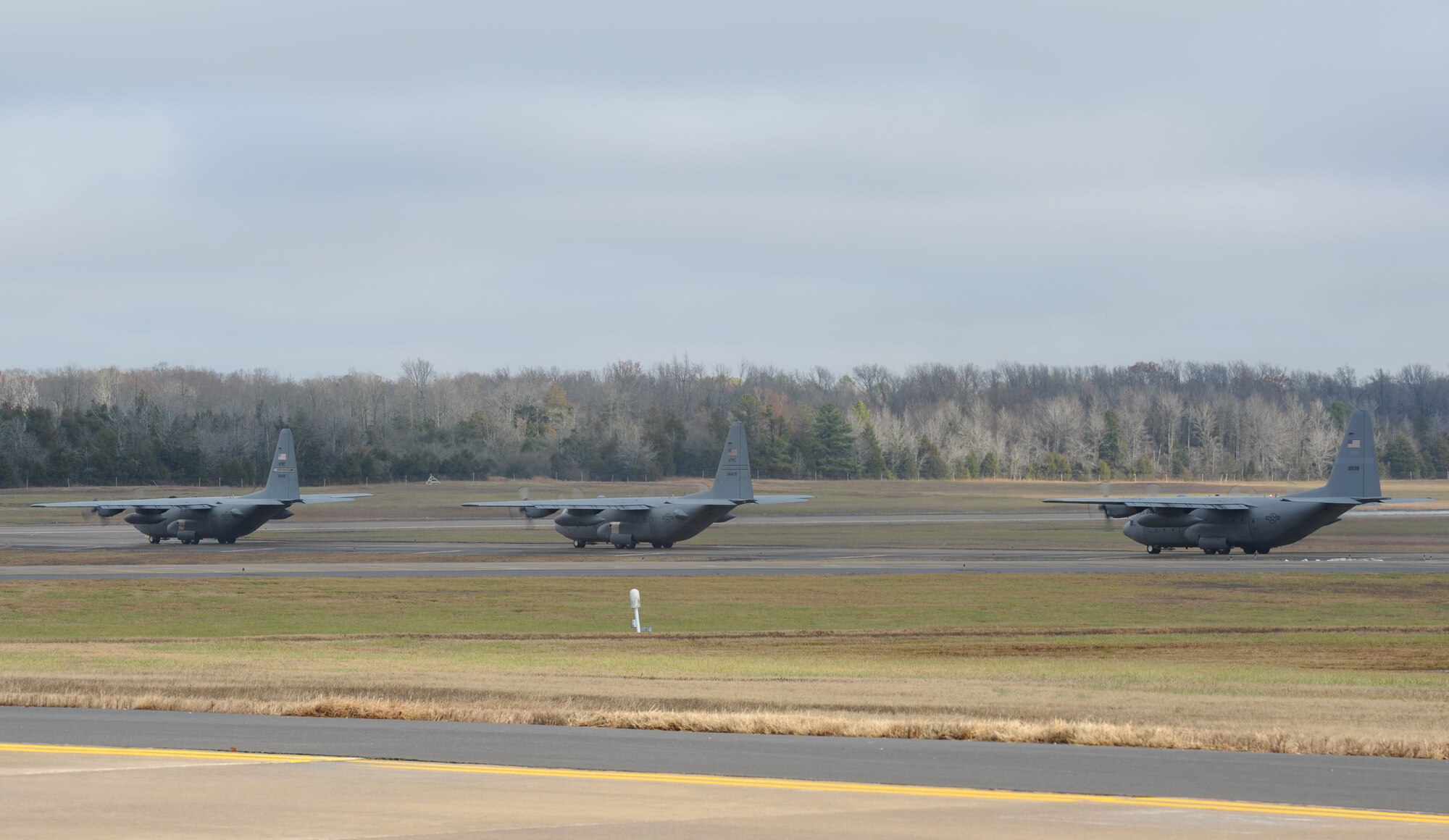 C-130s from the 50th Airlift Squadron and the 22nd Air Force Det. 1 prepare to take off for a mission Dec. 14, 2013, at Little Rock Air Force Base, Ark. The mission represents the first dedicated weekend of
sorties with active duty and reserve components coming together at Little Rock AFB. (U.S. Air Force photo by Staff Sgt. Caleb Pierce)

