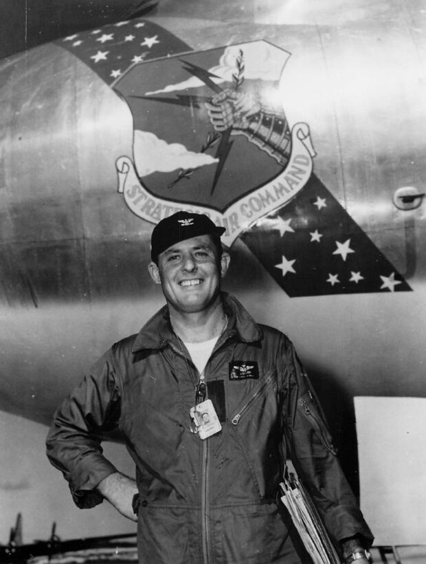 Colonel Jack Catton was the official escort for Mrs. Lewis Sebille when she received the posthumous award of the Medal of Honor for her husband's exploits in the Korean War. In 1952 Colonel Catton was at March Air Force Base and since then has been a Base and Wing Commander at Fairchild, and Wing Commander at Davis-Monthan Air Force Base. In 1956, he was trasnferred to Headquarters SAC. (Strategic Air Command archives)