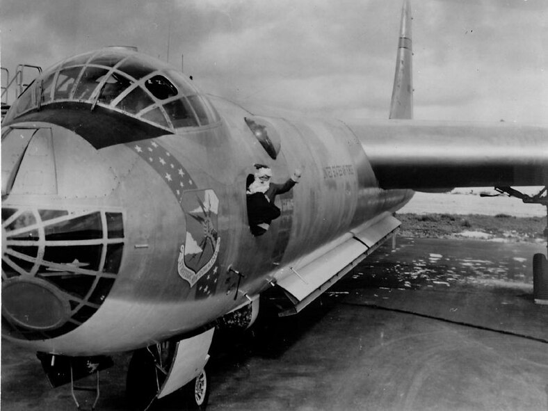 Twentieth Century progress requires a speedy vehicle for the Jolly visitor making his annual round-the-world trip from the North Pole in 1956. (Strategic Air Command archives)